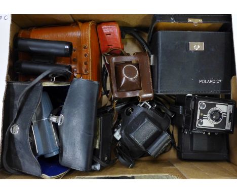 Two pairs of binoculars and six cameras; Kodak FK300 instant, Olympus 35-SP, Kodak Brownie Flash 20, Vest Pocket Kodak and tw