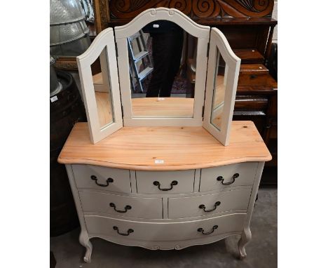 A pine top off-white painted serpentine chest of two short over two over one long drawer, to/with a matching folding dressing