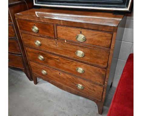 A George III mahogany chest of two short over three long graduated drawers on shaped bracket feet, 98 cm wide x 47 cm x 88 cm