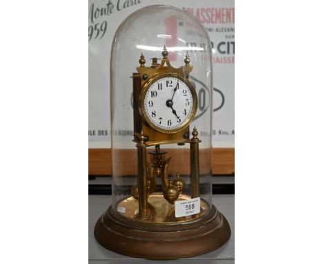 Glass-domed brass anniversary clock