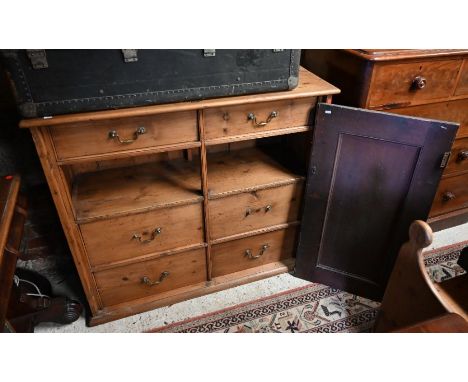 Antique stained pine cabinet with open shelf and six drawers c/w single (detached) panelled door, 118cm w x 44cm d x 105cm h