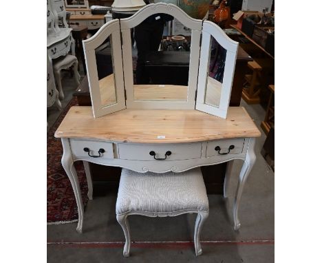 A pine top off-white painted serpentine three drawer side table to/with a matching folding dressing mirror and stool (3)