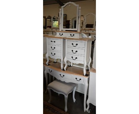 A three drawer pine top side table/desk to/w a stool, a pair of matching three drawer bedside chests and a mirror (5)