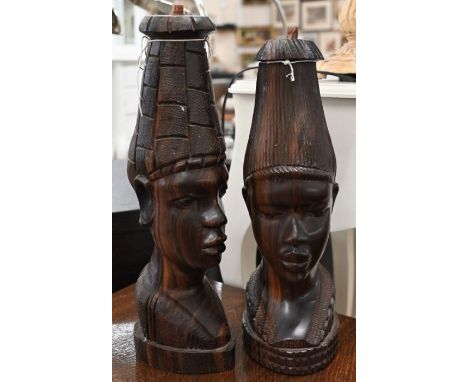 Two African tribal carved hardwood busts as lamp bases, 41 cm high