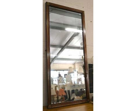 An Edwardian brass inlaid rosewood mirror (previously in a cheval frame), 69.5 cm wide x 151 cm high