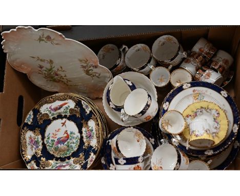 A set of eleven Victorian Staffordshire pottery 23 cm cabinet plates, printed, painted and gilded in the manner of 18th centu