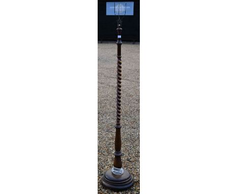 A mahogany barley twist standard lamp, 166 cm tall