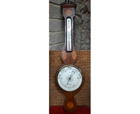 T T Johnson, Salisbury, a Sheraton Revival style inlaid satinwood barometer, 96 cm h