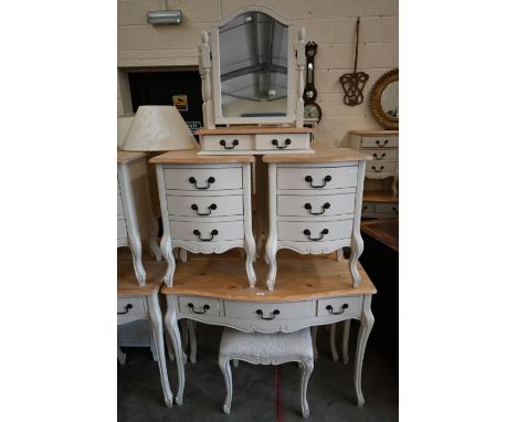 A pine top off-white painted serpentine three drawer side table to/with a matching pair of three drawer bedside chests, a dre