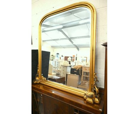 A large Victorian style gilt framed arched overmantle mirror, 137 cm h x 133 cm w