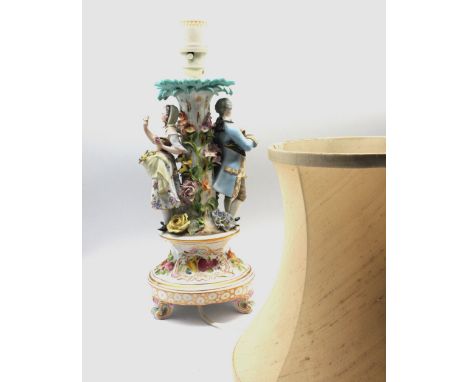A Continental 20th century comport base with two figures holding flowers, c. 20th century, 29cm high. Condition: chips to lea