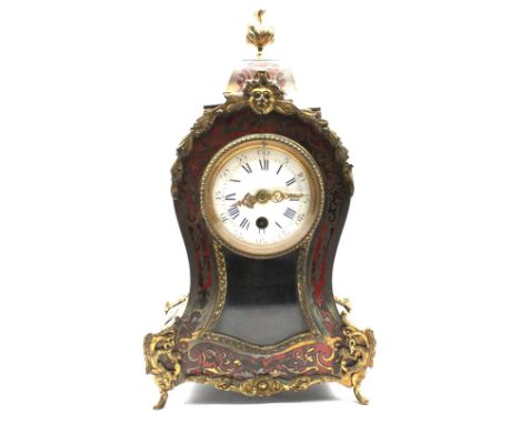 Mid 19th century French 8 day tortoiseshell and gilt spelter mantel clock with round enamelled face, Roman and Arabic numeral