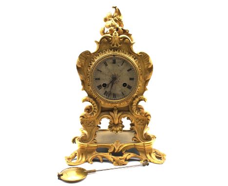 Mid 19th century French 8 day mantel clock with gilt ormolu case, Roman numerals, silvered engine-turned dial, strikes on hou