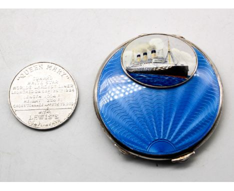 RMS Queen Mary Interest: a George VI silver circular compact case, having engine turned outer design and vibrant blue guilloc