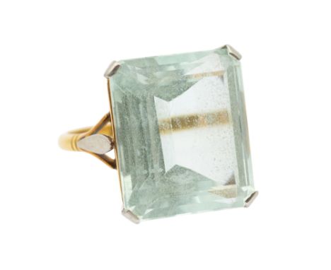 An aquamarine and 18ct two tone gold ring, comprising rectangular step cut aquamarine, measuring approx 16 x 18mm, weight app
