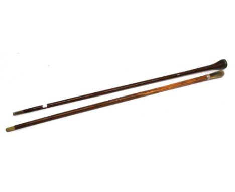 A late 19th / early 20th century oak walking cane, with white metal and citrine style glass top, probably Scottish with cast 