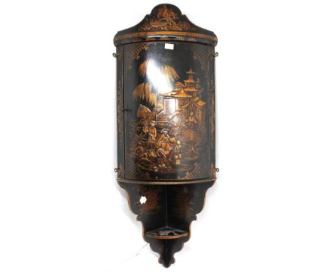 An early 20th Century lacquered small Chinese decorated bow front wall hanging corner cupboard with ornate top board above an
