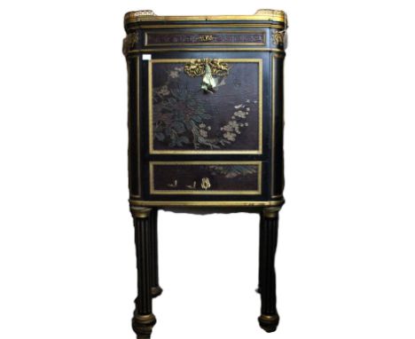 A 19th Century Japanese style writing cabinet, probably made in Paris in the late 19th Century with marble top and gilt galle