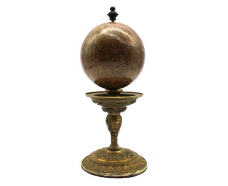 A 19th century French small terrestrial globe, by Delamarche, Paris, circa mid 19th century, globe of traditional shape with 