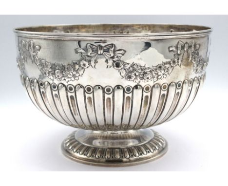 A Victorian silver rose / punch bowl, chased ribbon tied swags above gadroon section, hallmarked by William Hutton & Sons., L