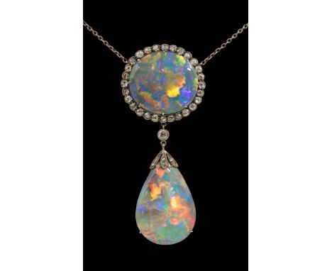 An early 20th century diamond and opal necklace, comprising of a large black oval opal cabochon measuring approximately 22 x 