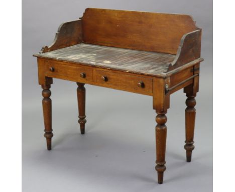 A late 19th/early 20th century stained pine tray-top side table, fitted two frieze drawers &amp; on turned tapered legs, 42” 