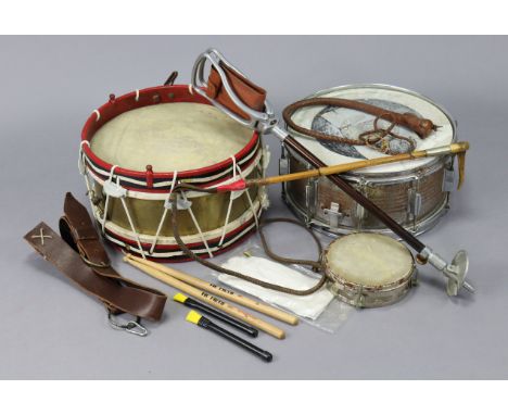 A fibre-covered travelling trunk with hinged lift-lid, 35” wide; together with a riding crop; two drums, etc.
