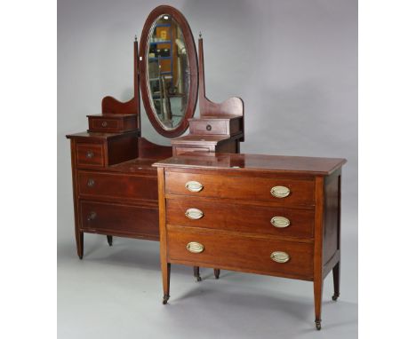 An Edwardian inlaid-mahogany small chest fitted three long graduated drawers with brass swing handles, &amp; on short square 