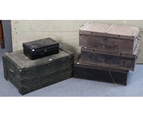A green painted wooden storage trunk with hinged lift-lid, 26¾” wide; together with three japanned-metal travelling trunks, 2