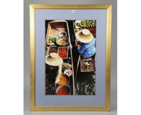 A large coloured photographic print depicting Thai food vendors on the water market in Bangkok, 29½” x 19¾”, in glazed gilt f