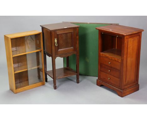 A mahogany bedside cupboard enclosed by a panel door, &amp; on square tapered legs with an open undertier, 15½” wide; togethe