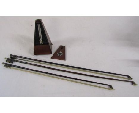 Metronome and 3 violin bows
