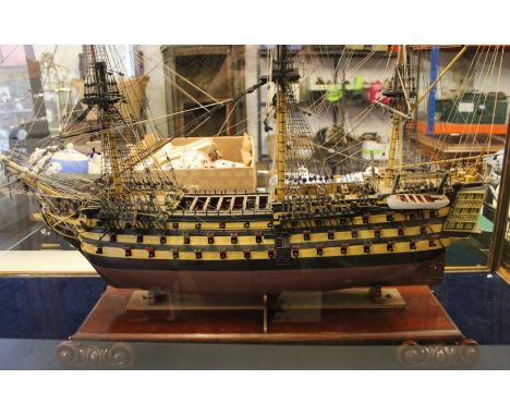 Large cased model of HMS Victory (case size 127cm by 98cm) with Haynes HMS Victory owners workshop manual