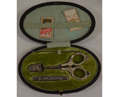 Leather sewing case containing silver handled scissors, needle case &amp; thimble&nbsp;