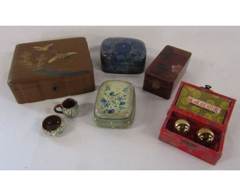 Collection of trinket boxes (some lacquered) including one marked Mexico, and Chinese Baoding balls