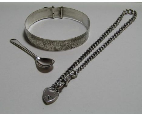 Silver locket and chain Birmingham 1907, each link bearing the silver mark, London WH 1964 silver bangle and John Rose Birmin