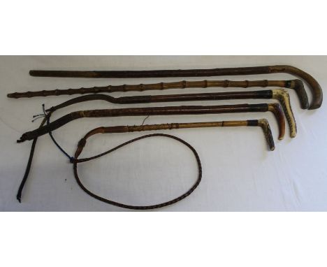 Three vintage riding crops &amp; bamboo walking cane &amp; one other