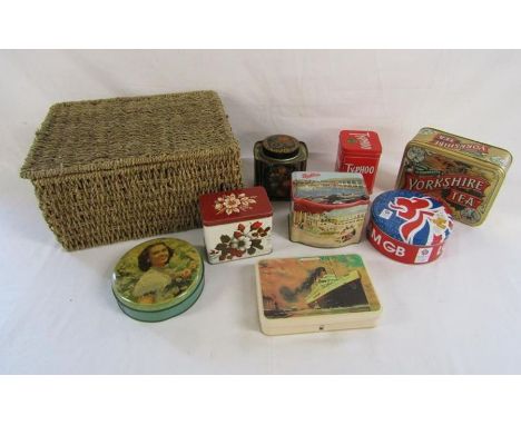 Collection of vintage tins stored in a modern wicker basket includes Walters palm toffee, Butlin's etc