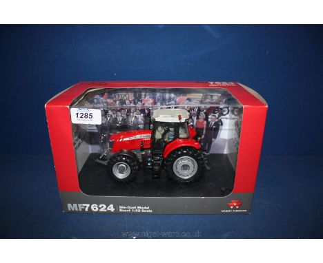 A boxed Massey Ferguson MF624 die cast model 1:32 scale.