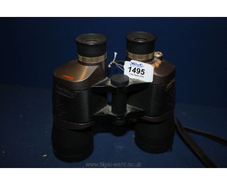 A pair of Binoculars by Timer, 9 x free focus, ruby coated.