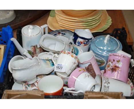 A large quantity of Souvenir china including cups and saucers, coffee pot from Chepstow Castle, Golsford Market Place, teapot