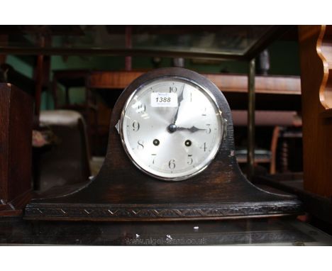 A Napoleon Hat style chiming Mantle Clock.
