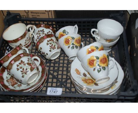 A Royal Sutherland part Teaset with yellow rose decoration comprising five saucers and plates and six saucers together with a