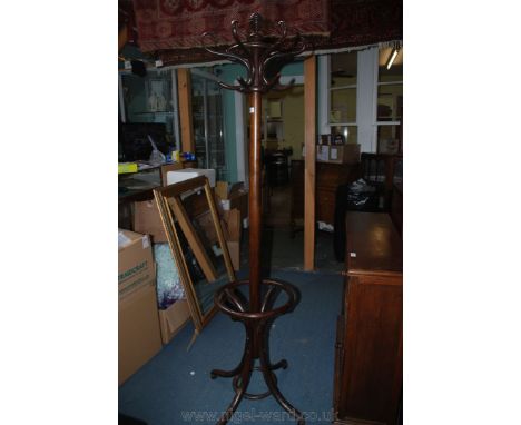 A bentwood Hat Stand, having ring turned ball top, over the six bentwood hooks, circular lower four compartment stick/umbrell