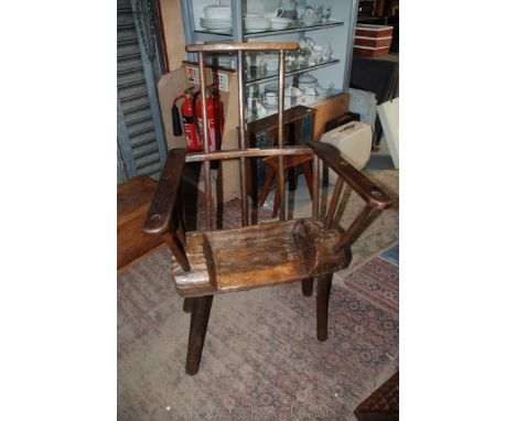 An Oak and Ash primitive style rustic Stick and dug-out Elbow Chair