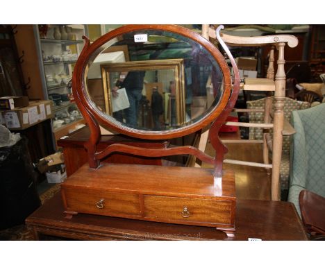 A Mahogany framed dressing Mirror with lyre shaped frame and two drawers to the base.