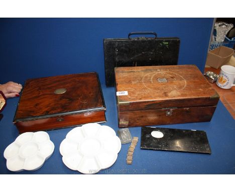 A quantity of miscellanea including two writing Slopes (as found), metal watercolour Boxes and ceramic mixing trays, etc.