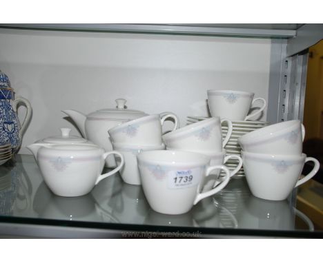 A Wedgwood 'Talisman' Teaset comprising eight cups and saucers, sugar bowl, milk jug and Teapot, unused.