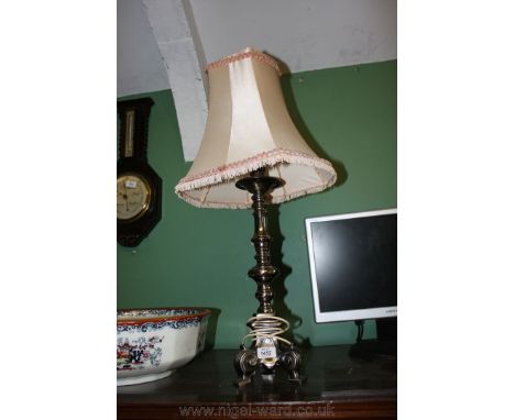 A white metal Table Lamp with pink shade.