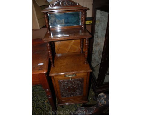 An elegant Victorian three tier Purdonium, the top being carved upstand back on a moulded edge shelf over bevel plated mirror